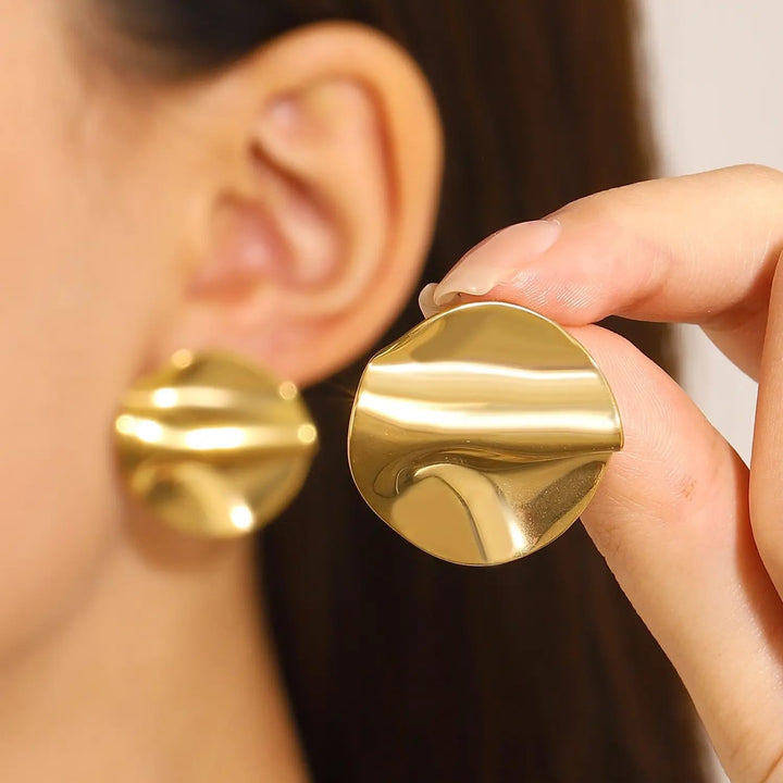 Shop modern wavy gold disc earrings – stainless steel, durable & elegant