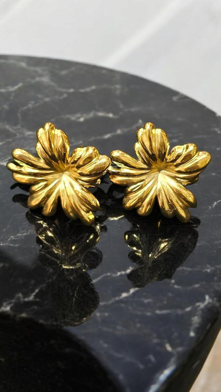 Buy stainless steel petal-shaped earrings for women, modern gold floral studs
